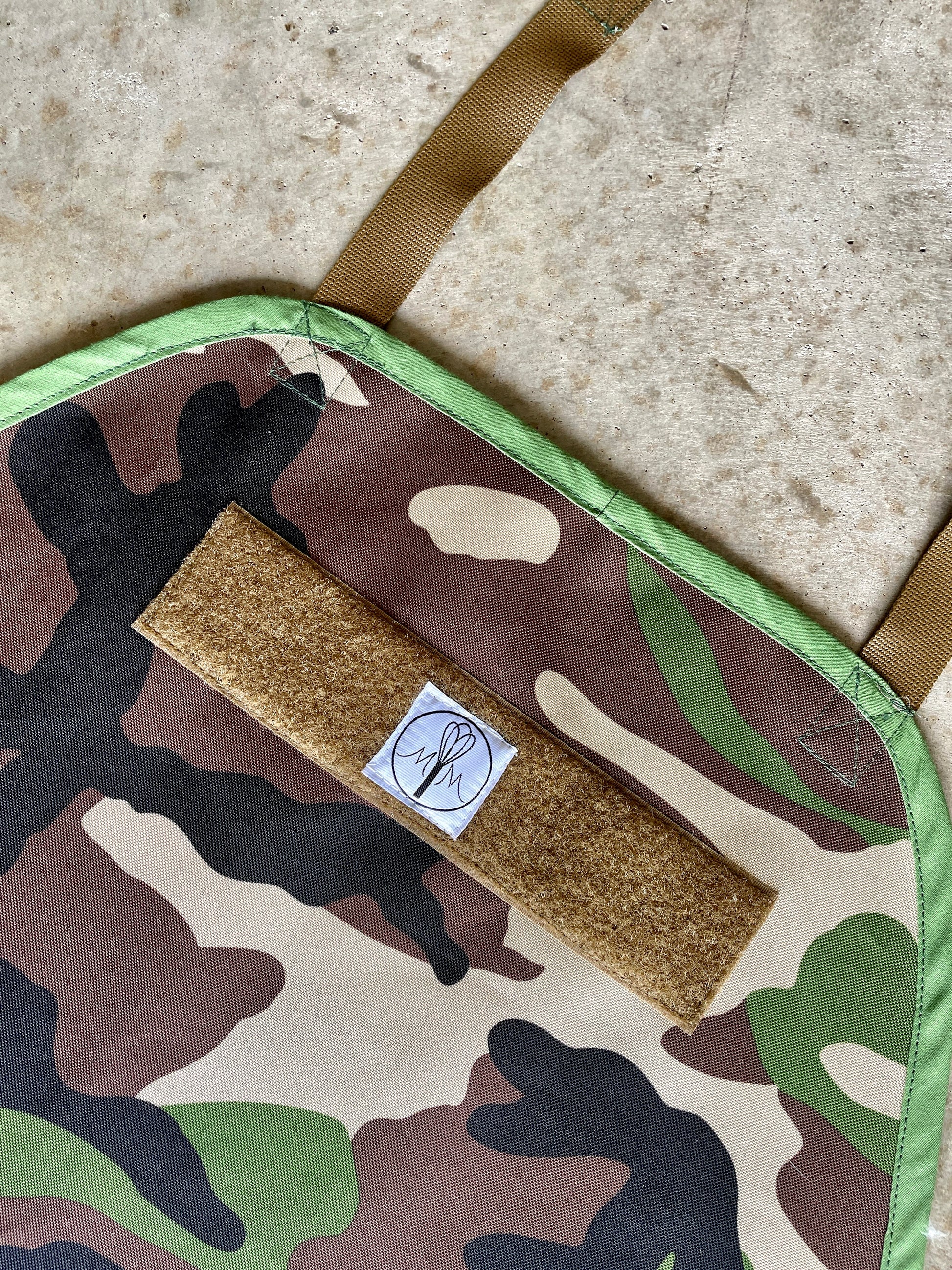 Two Medium Sized Ladies The Rambo mens ottertex waterproof camouflage apron coyote brown strings hook and loop closeup of patch area