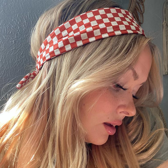 Amanda Bright Designs The Original Tie Headband Orange Check on model