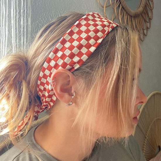 Amanda Bright Designs The Original Tie Headband Orange Check on model