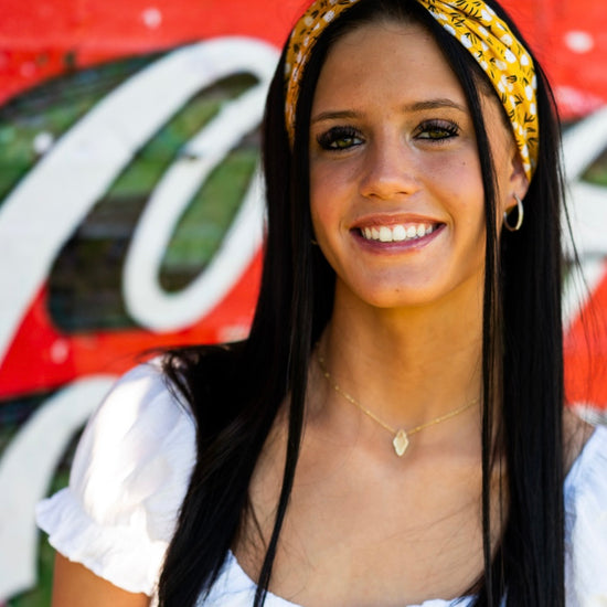 Amanda Bright Designs The Original Tie Headband Yellow Floral midcentury retro on model