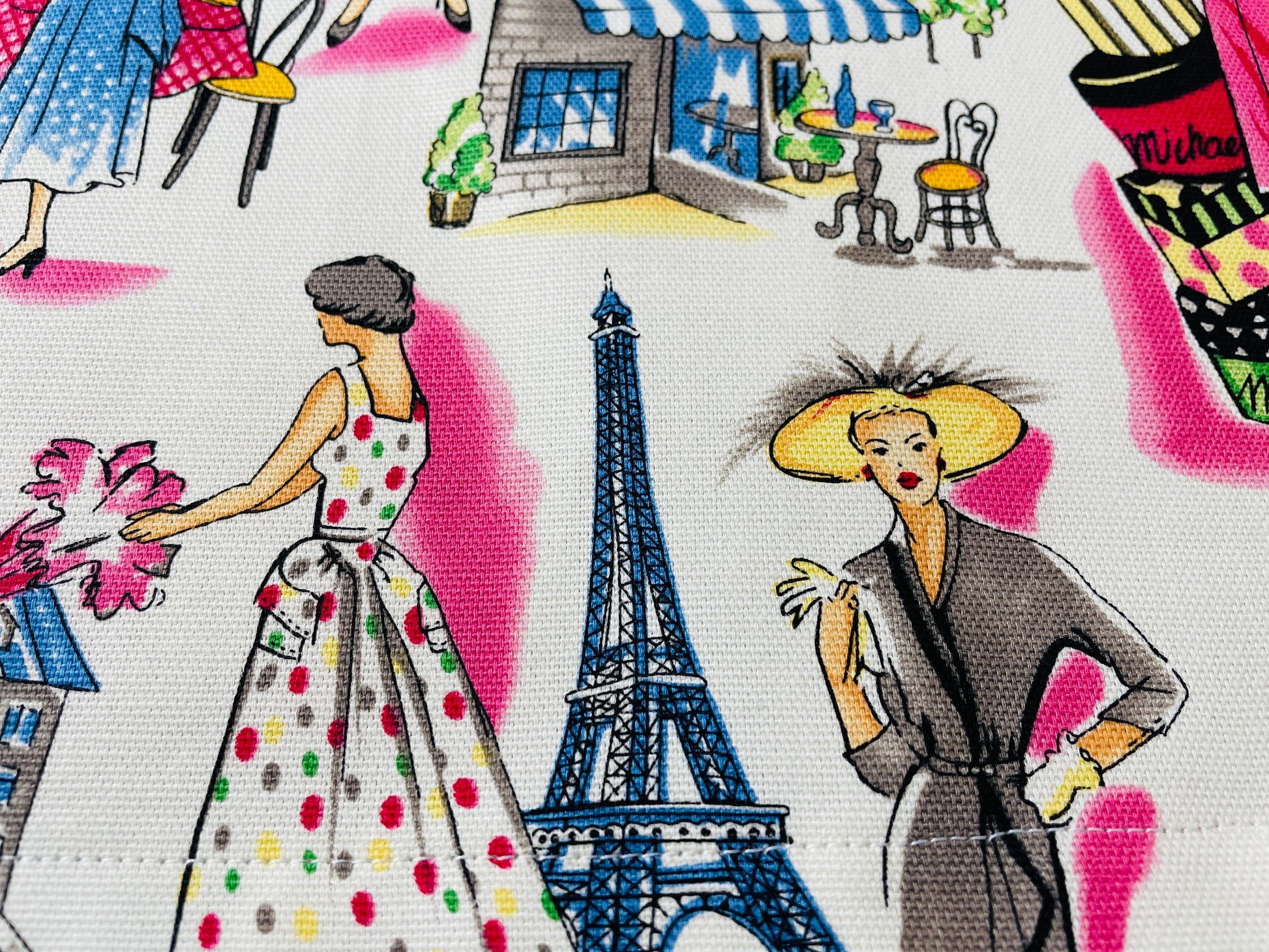 Two Medium Sized Ladies Audrey Hepburn Springtime in Paris France Retro Fashion Shopping Vintage Apron Pattern Eiffel Tower Cafe Closeup