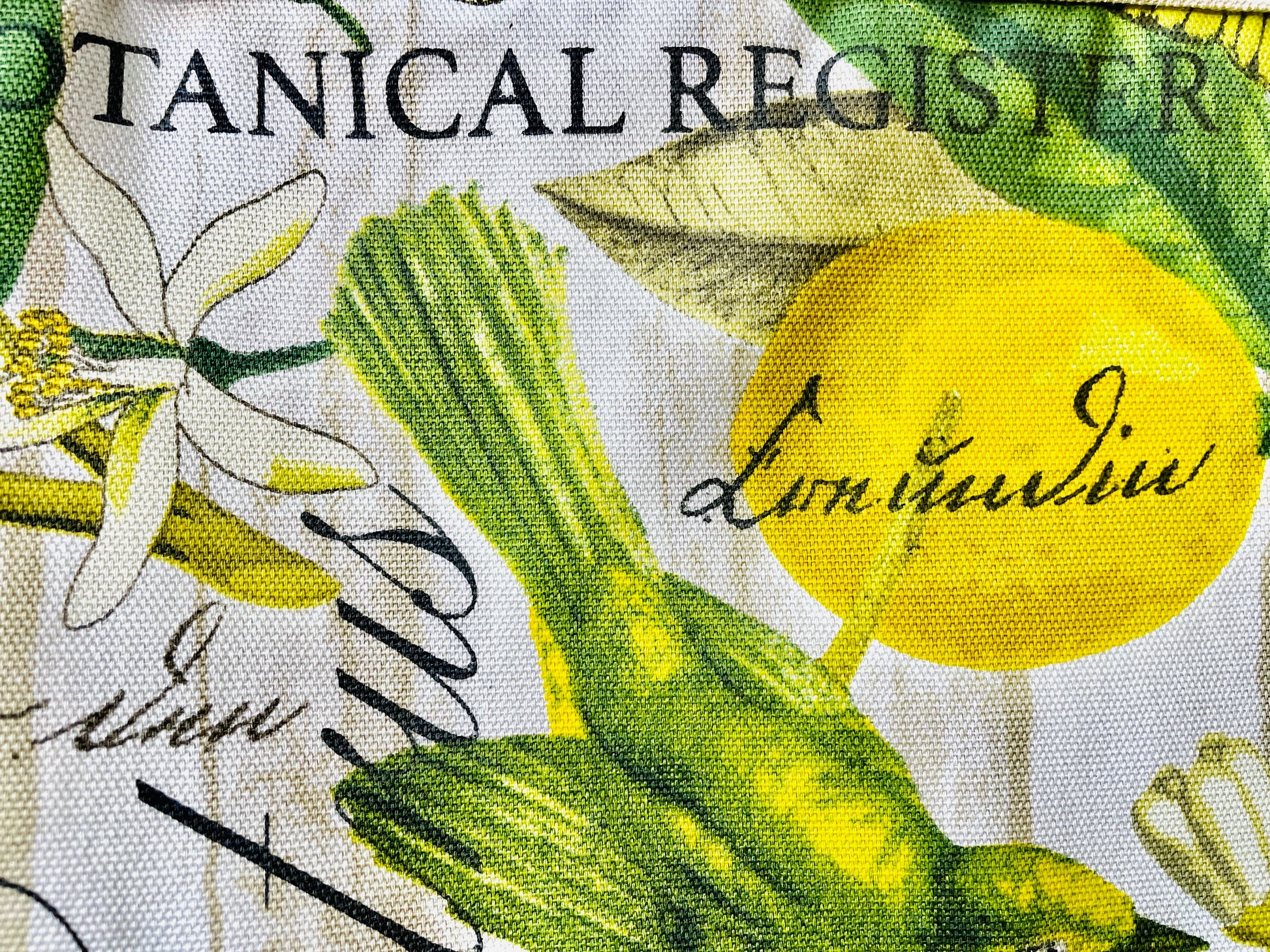Two Medium Sized Ladies Brittany Apron yellow and green botanical print fabric lemons flowers the botanical register apron fabric pattern