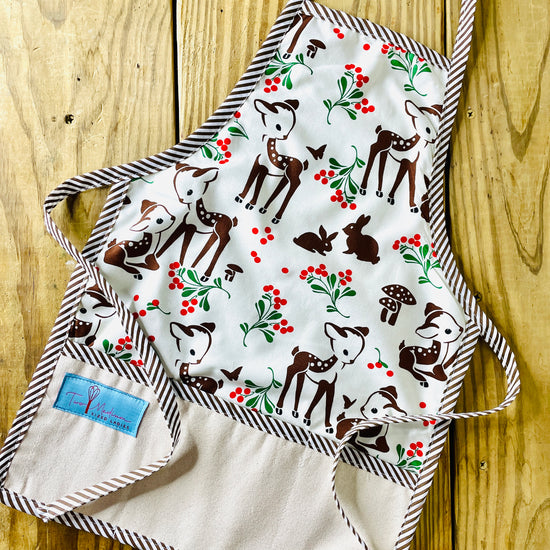 Two Medium Sized Ladies Forest Fawn Children's Christmas Apron Forest Fawn Reindeer Rudolph Chocolate Brown Pinstripe Apron strings and trim