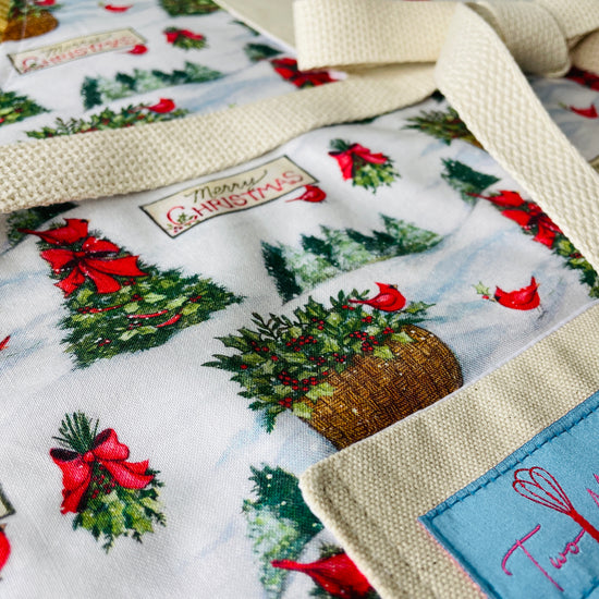 Two Medium Sized Ladies Christmas Forest Apron Merry Christmas Vintage Tree Red Bows Red Cardinals Pine Aspen Spruce Holly Snow Drift Close Up View