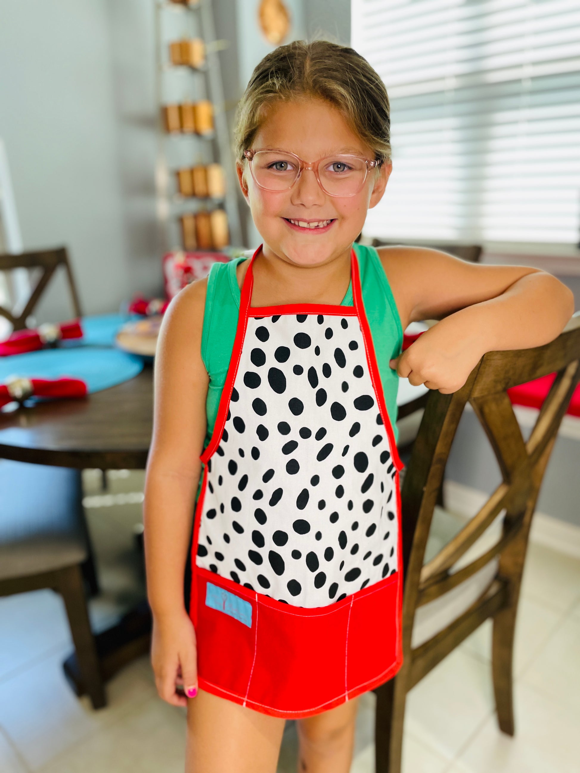 Two Medium Sized Ladies Dalmatian Print Children's Apron part of Mommy & Me Apron Set for baking cooking time together in the kitchen