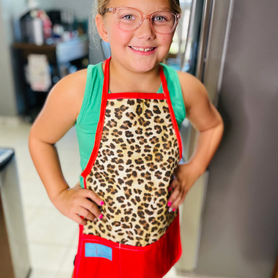 Two Medium Sized Ladies Leopard print Mommy & Me Apron Set Children's Apron for baking cooking family time in kitchen kids
