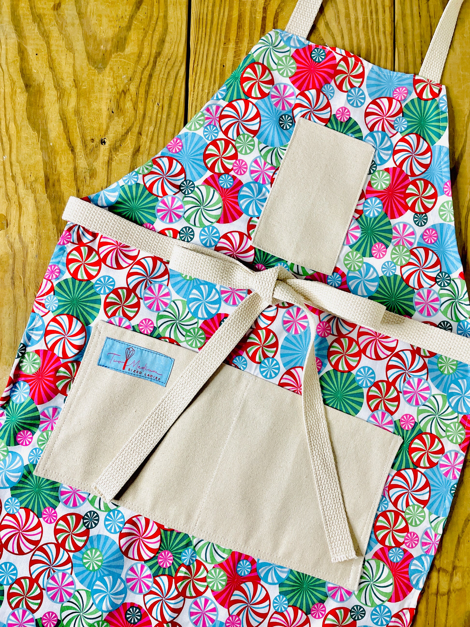 Two Medium Sized Ladies Peppermint Lane Candy Apron for baking cooking Christmas in the kitchen serving entertaining