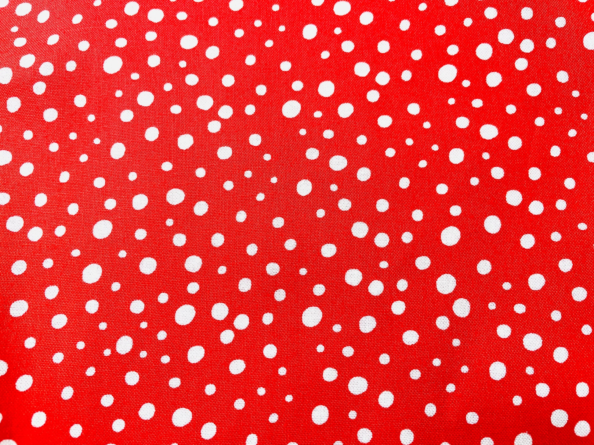 Two Medium Sized Ladies quilting cotton fabric with vintage snowflake pattern for vintage snowfall apron red background with white snowflakes