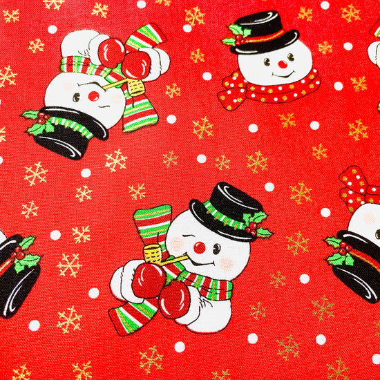 Two Medium Sized Ladies frosty the snowman apron quilting cotton winking snowman smiling with corn cob pipe button nose eyes made out of coal
