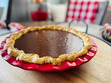 Two Medium Sized Ladies Vintage Chocolate Pie Pudding Baking 1950s 1960s 1970s 1980s Recipe on Kitchen Table for Thanksgiving and Christmas Holiday Dessert