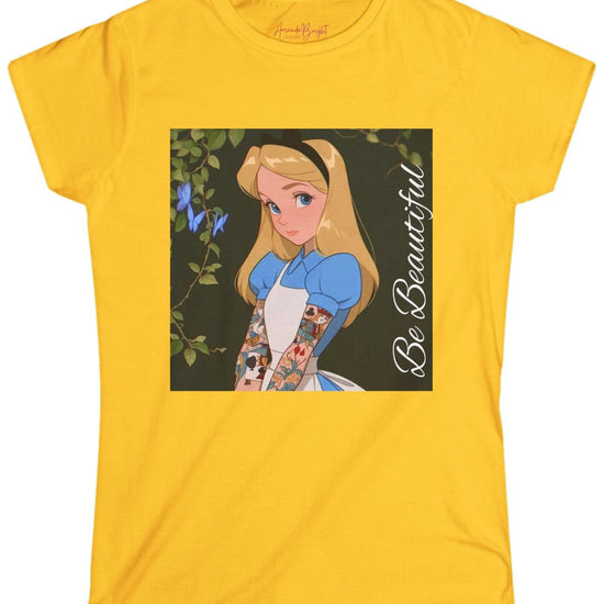 Amanda Bright Designs graphic tshirt Be Beautiful series Alice in Wonderland tattooed sleeve yellow gold short-sleeve t-shirt with a graphic print of Alice from Alice in Wonderland, featuring her blonde hair, blue dress, and the text 'Be Beautiful' written vertically on the right side of the graphic.