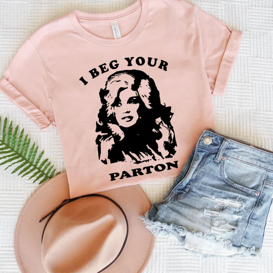 Amanda Bright Designs Beg Your Parton Dolly Parton blush peach tee tshirt design