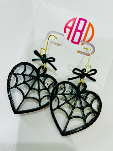 Amanda Bright Designs halloween earrings black glitter acrylic spiderweb heart earrings with bow