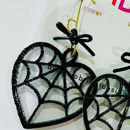 amanda bright designs black glitter acrylic spiderweb heart and bow earrings halloween