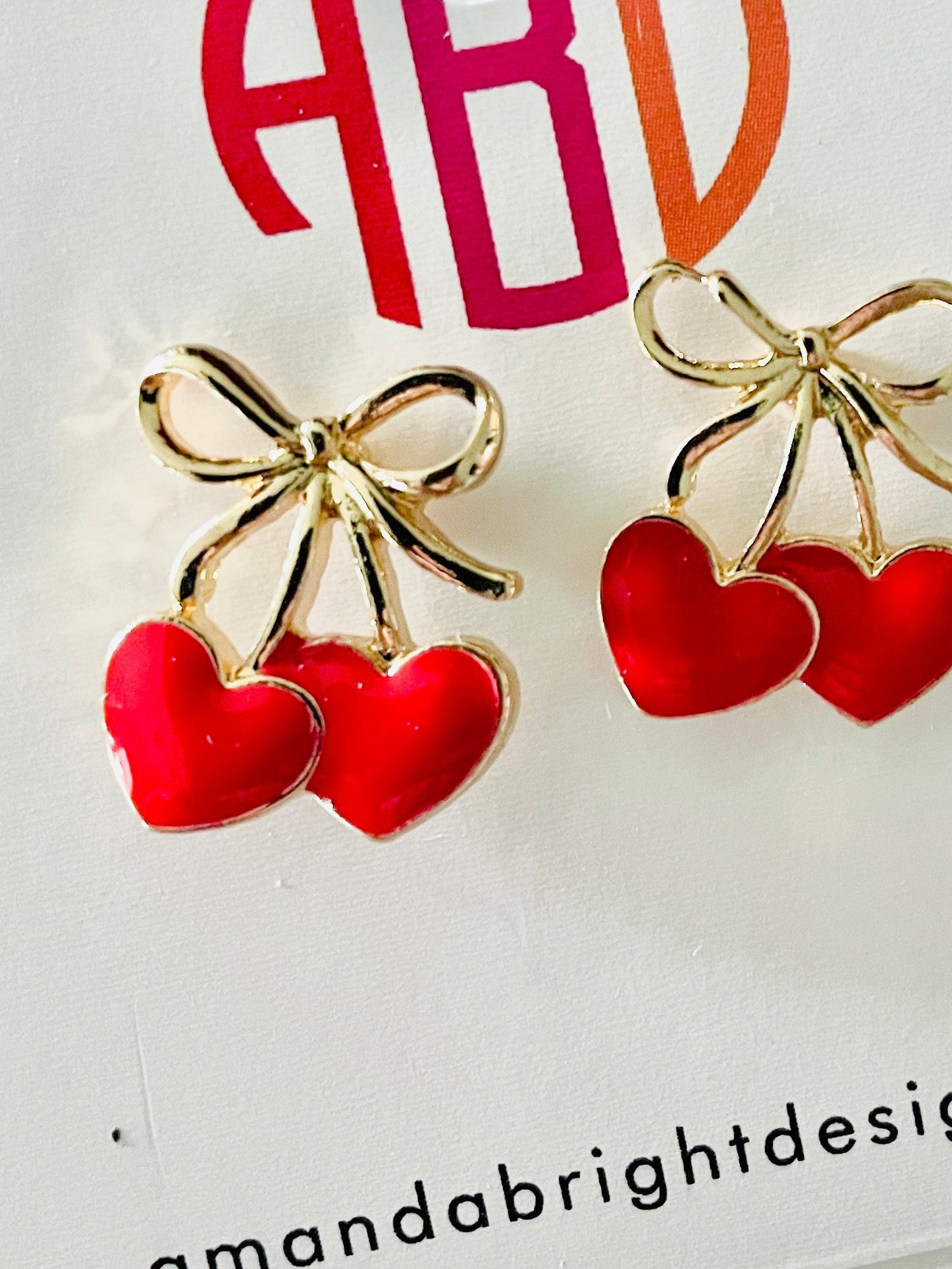 Amanda Bright Designs, gold bow and red cherry post stud style earrings