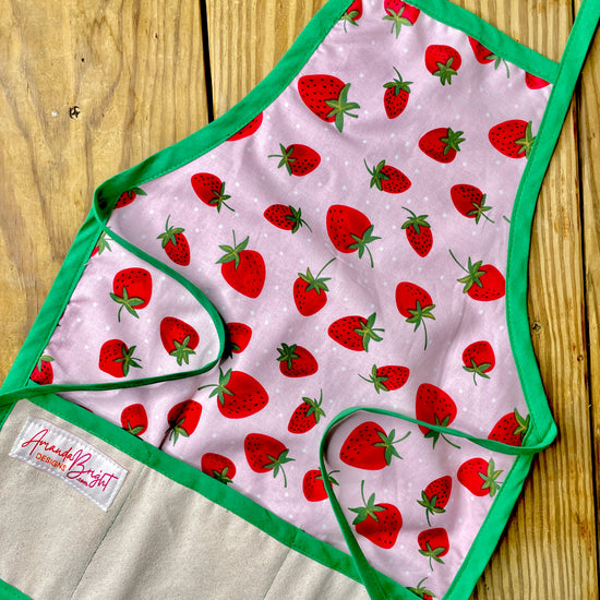 Amanda Bright Designs childrens strawberries pink fruit summer apron for bake time play time green apron strings