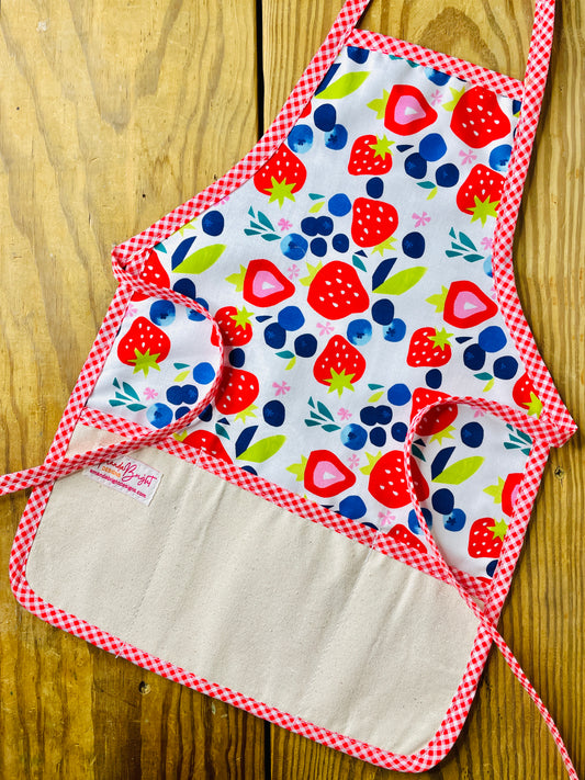 Amanda Bright Designs children’s summer apron berries galore strawberries blueberries red gingham trim 