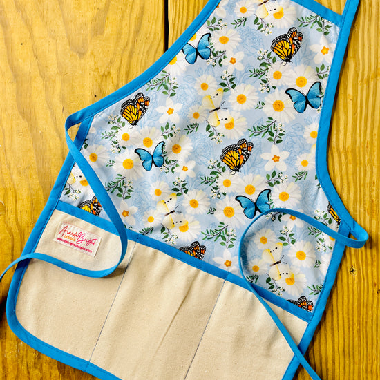 Amanda Bright Designs butterflies monarch white flowers children’s apron for baking cooking crafts gardening