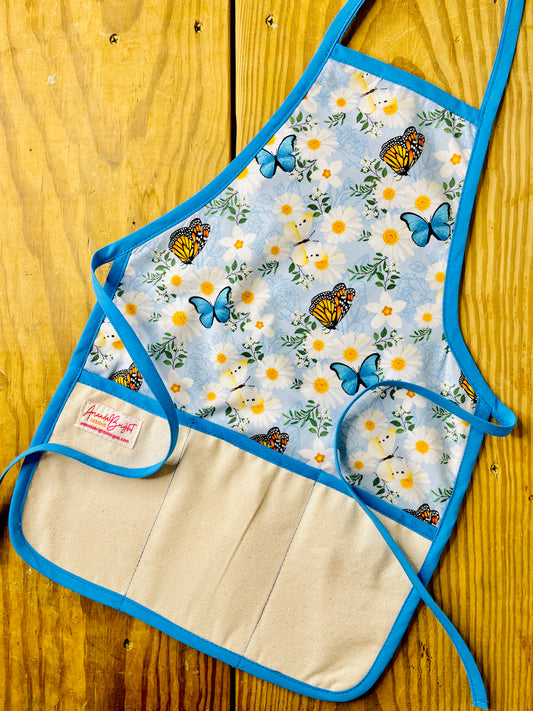 Amanda Bright Designs butterflies monarch white flowers children’s apron for baking cooking crafts gardening