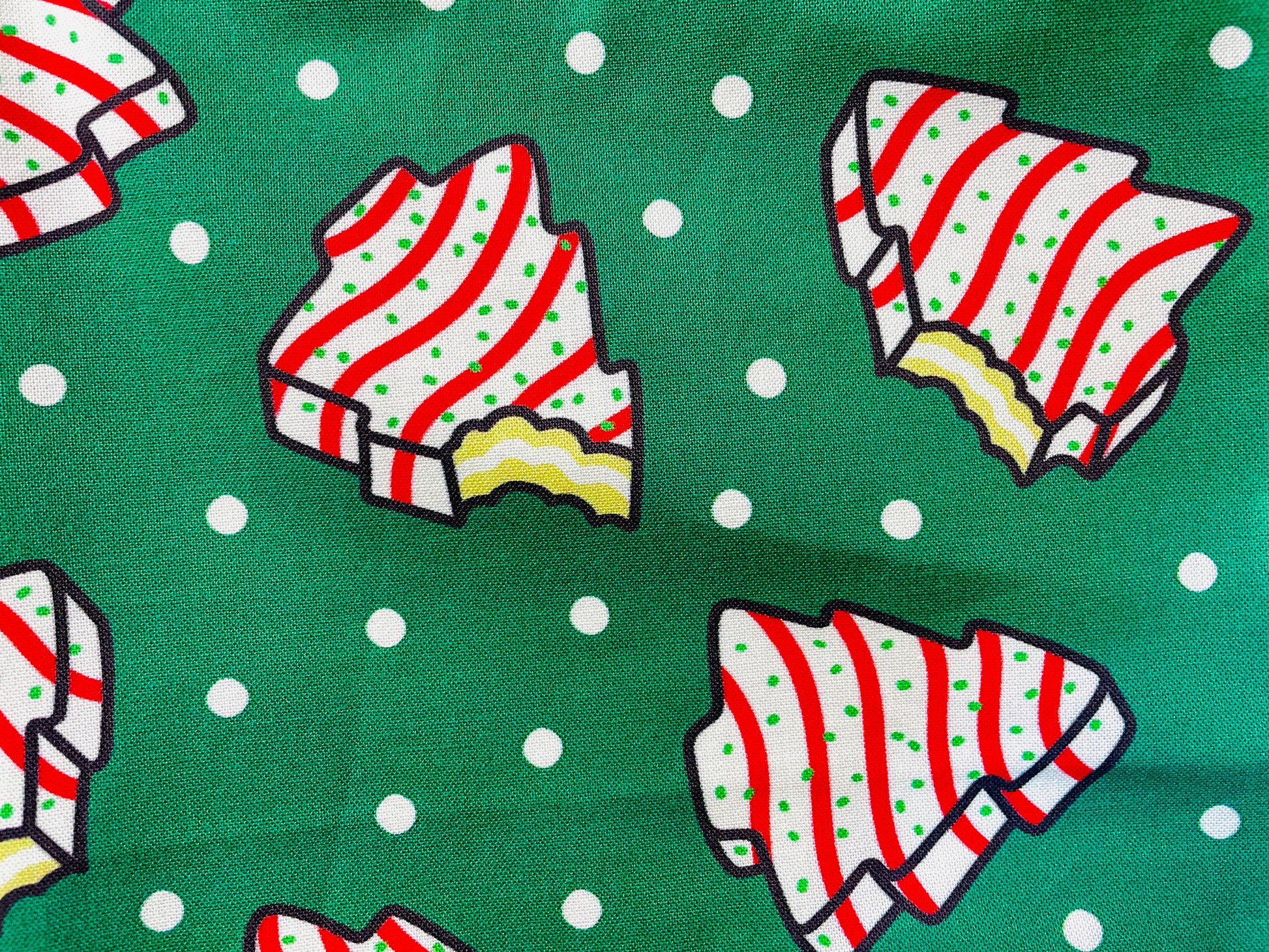 Amanda Bright Designs Couture Apron Little Debbie white with red icing Christmas Tree Cake Apron on green polkadot fabric for the holidays