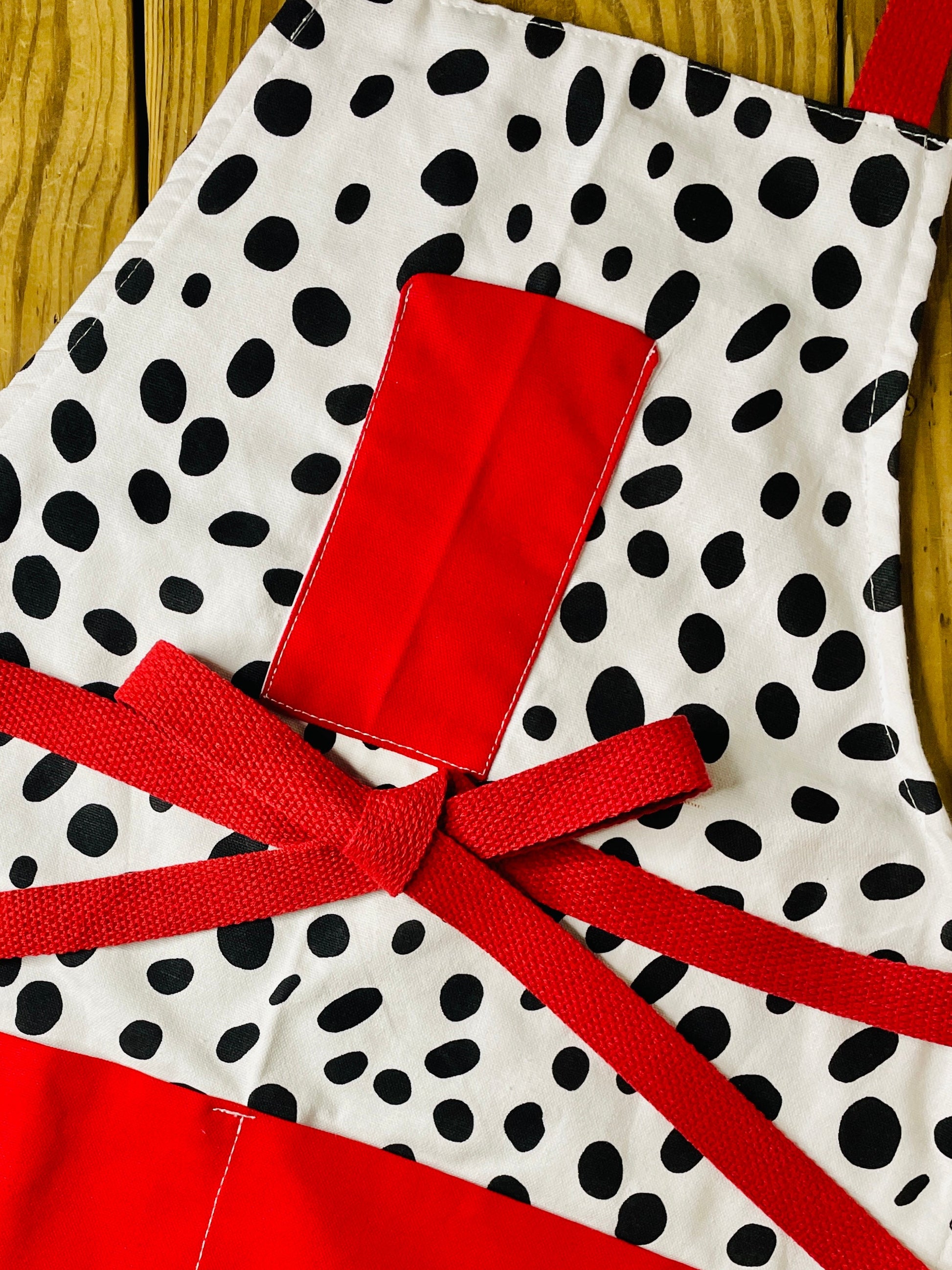 Amanda Bright Designs Dalmatian print apron with red pockets and strings