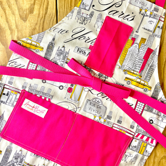 London, Paris, New York themed apron with hot pink pockets and strings Amanda Bright Designs