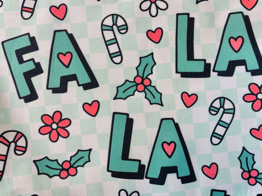 manda Bright Designs Fa La La Christmas Apron in green checkered with candy canes and flowers