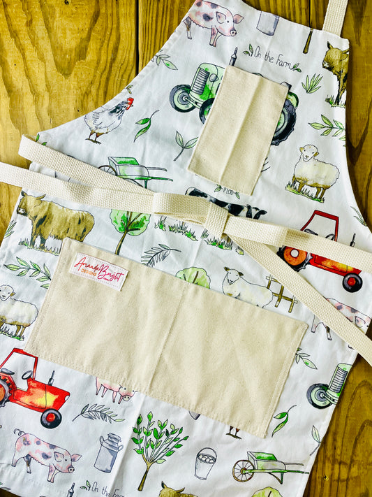 Amanda Bright Designs farm garden ranch apron highland cow wheelbarrow tractor
