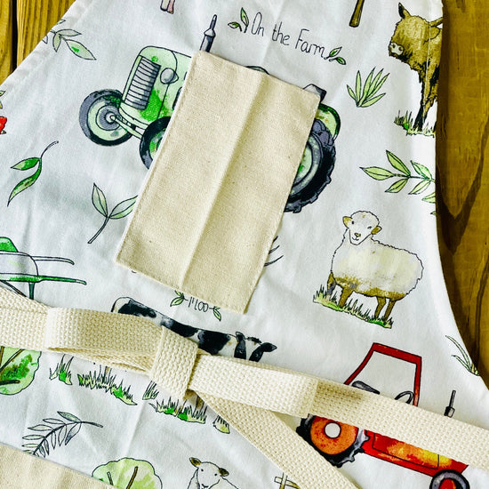 Amanda Bright designs tractor farm garden ranch highland cow apron