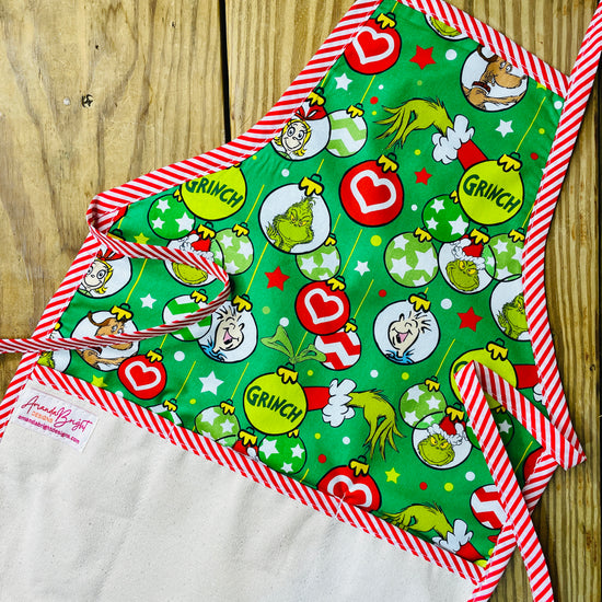 Amanda Bright Designs Children's Christmas Aprons Grinch Hello Kitty Nightmare Before Christmas Gingerbread Kitchen Baking Mommy and Me Peppermint Swirl Forest Fawn Rudolph