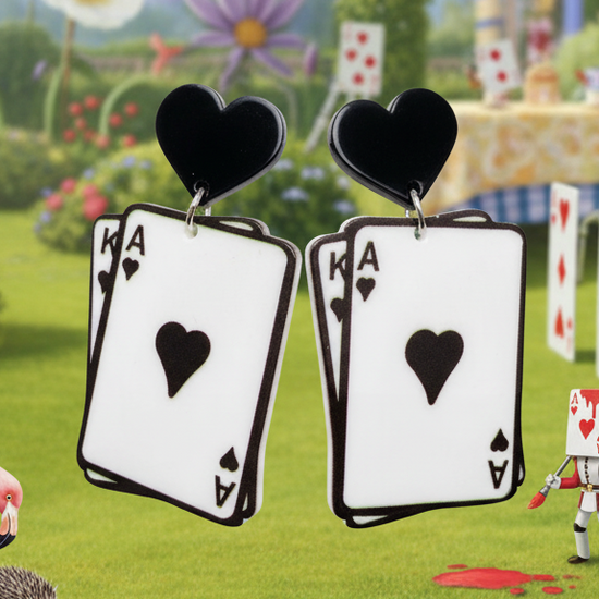 Amanda Bright Designs Playing card earrings with hearts in Alice in Wonderland backdrop