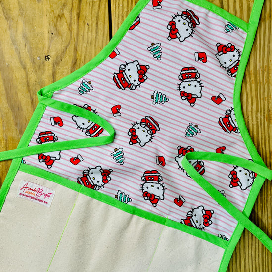 Amanda Bright Designs Children's Christmas Aprons Grinch Hello Kitty Nightmare Before Christmas Gingerbread Kitchen Baking Mommy and Me Peppermint Swirl Forest Fawn Rudolph