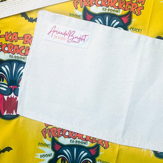 Amanda Bright Designs Ka-Boom Black Cat Fireworks Yellow and Black Bats Halloween Apron