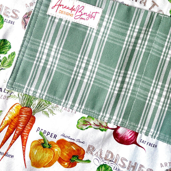 Amanda Bright Designs farmhouse kitchen cotton apron with vegetables and green plaid pockets