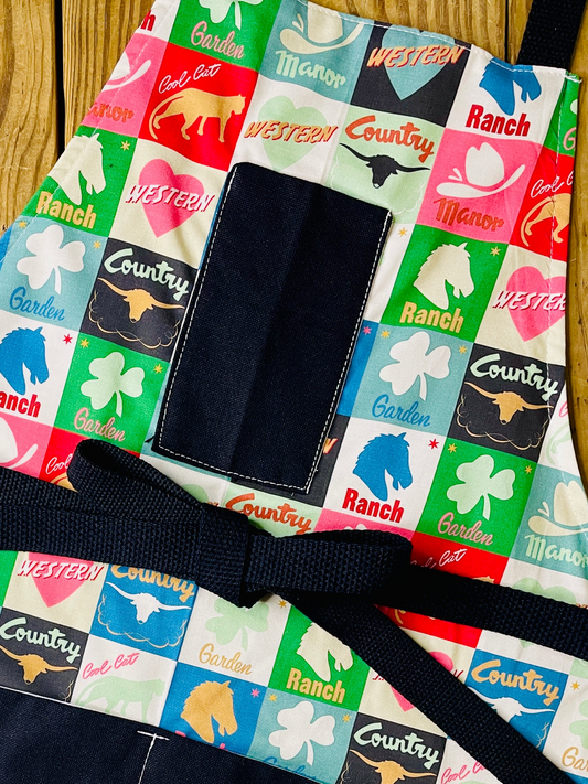 Amanda Bright Designs custom apron pattern featuring matchbook cover checkerboard colorful ranch country western horses cattle steer clovers