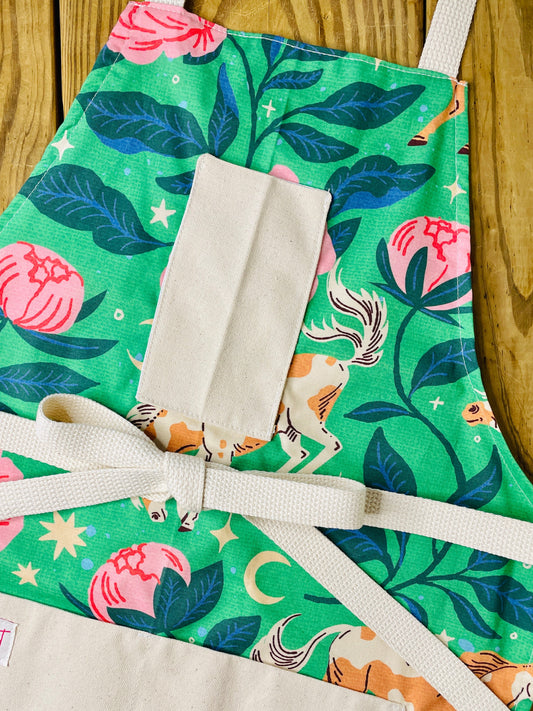 Amanda Bright Designs Moonlit Meadows apron with horse and pink peonies stars moon floral pattern on green background