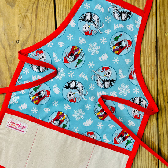 Amanda Bright Designs Children's Christmas Aprons Grinch Hello Kitty Nightmare Before Christmas Gingerbread Kitchen Baking Mommy and Me Peppermint Swirl Forest Fawn Rudolph Jack Sally