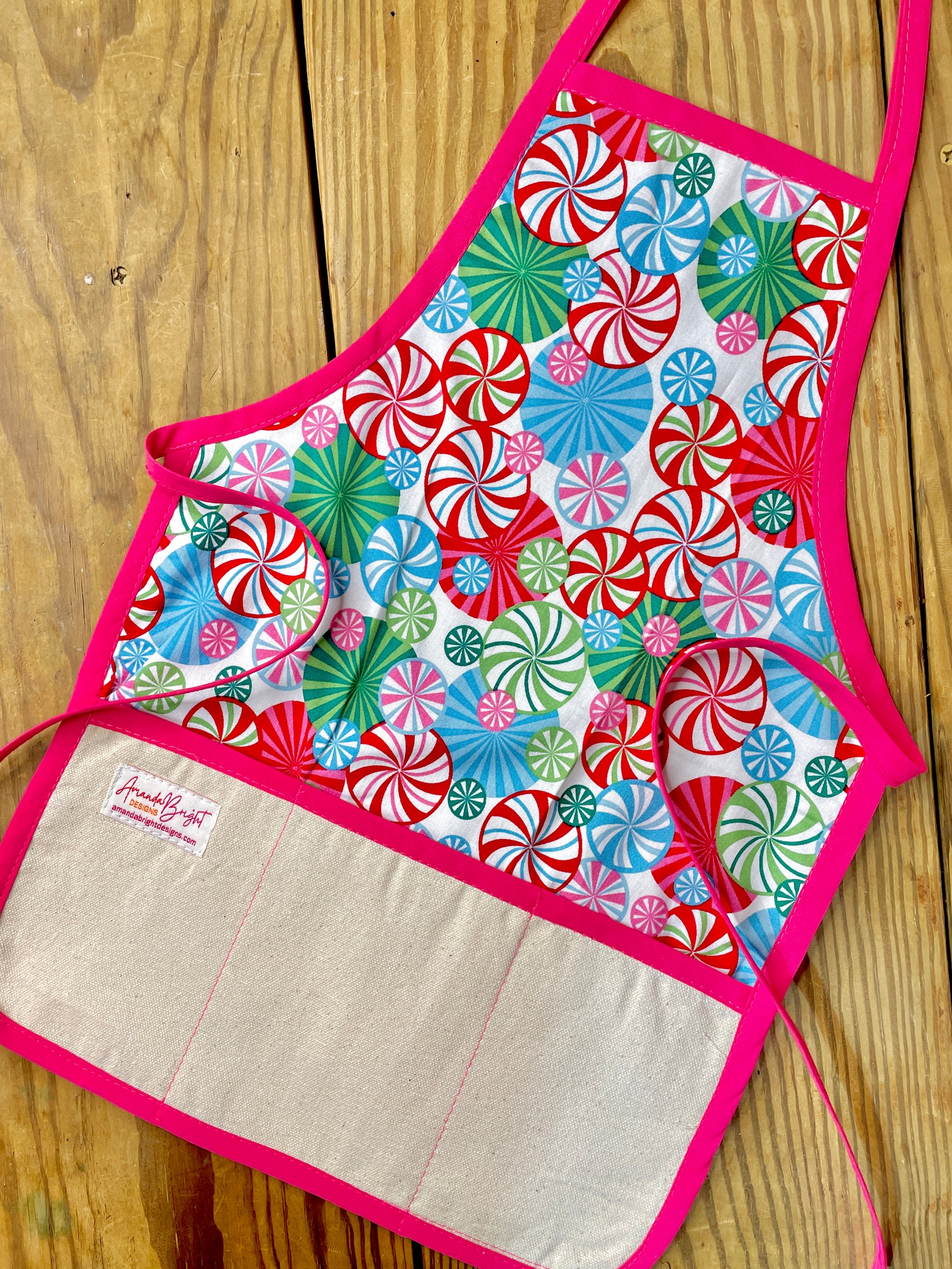 Amanda Bright Designs Children's Christmas Aprons Grinch Hello Kitty Nightmare Before Christmas Gingerbread Kitchen Baking Mommy and Me Peppermint Swirl Forest Fawn Rudolph