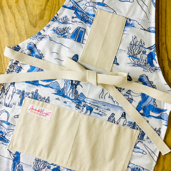 Amanda Bright Designs apocalyptic apron featuring movie scenes from Godzilla them war of the world, planet of the apes