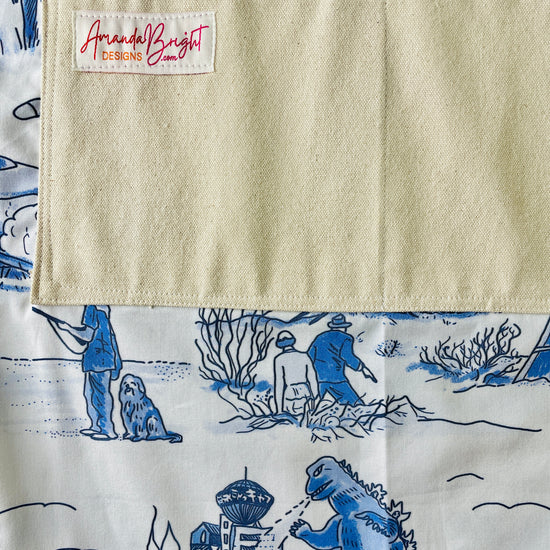 Amanda Bright Designs apocalyptic, apron, pen, and ink Godzilla war of the worlds boy and his dog 