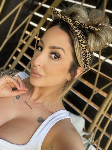woman wearing leopard headband with ponytail fashion Amanda bright designs