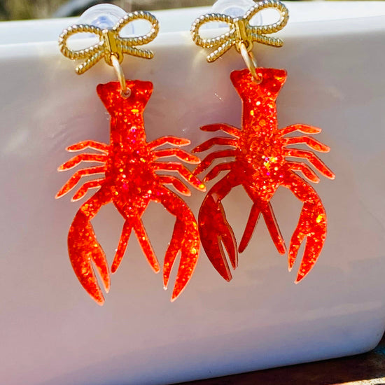 Amanda Bright Designs crawfish acrylic earrings with gold bow