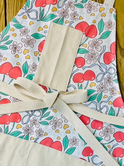 Amanda Bright Designs summer bows and cherries apron dainty blue bows pink flowers yellow hearts pink cherries