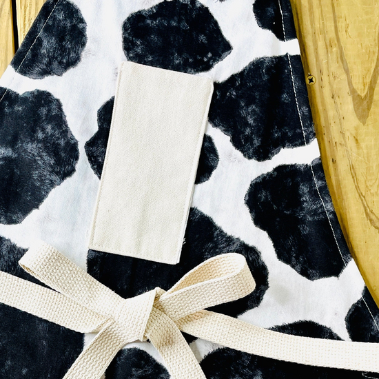 Amanda Bright designs western cowprint apron