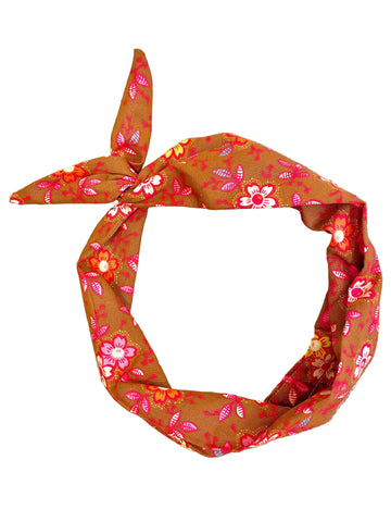 Amanda Bright Designs knotted cotton headband with a retro floral pattern in orange, pink, cinnamon and white
