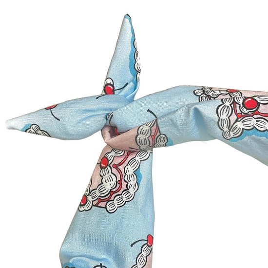 Amanda Bright Designs pink and blue cake themed headband with state of Texas and cherries on top