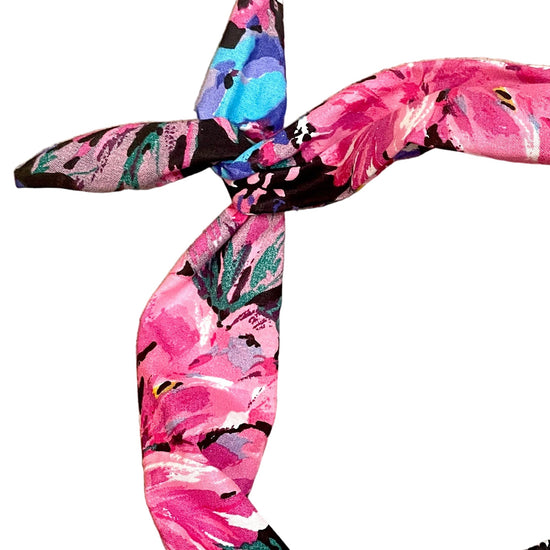 Amanda Bright Designs Original Tie Headband with oversized flowers in hues of pink purple teal and yellow on black fabric midnight floral