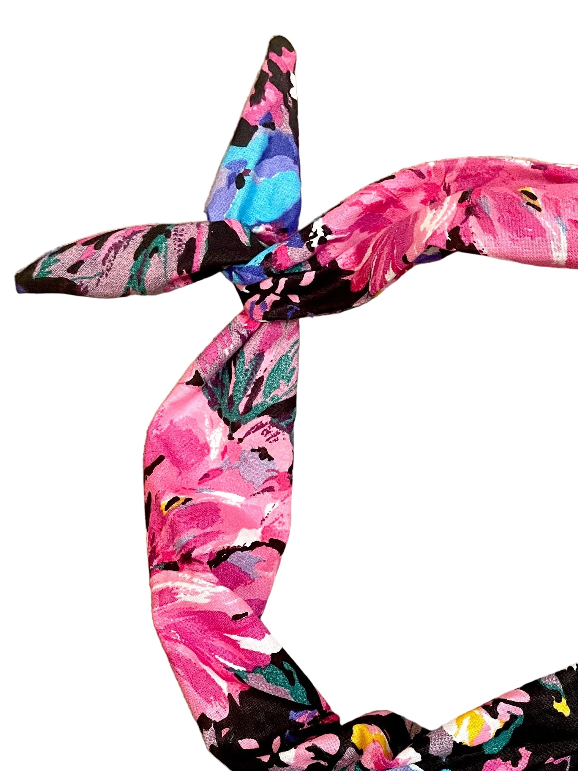 Amanda Bright Designs Original Tie Headband with oversized flowers in hues of pink purple teal and yellow on black fabric midnight floral