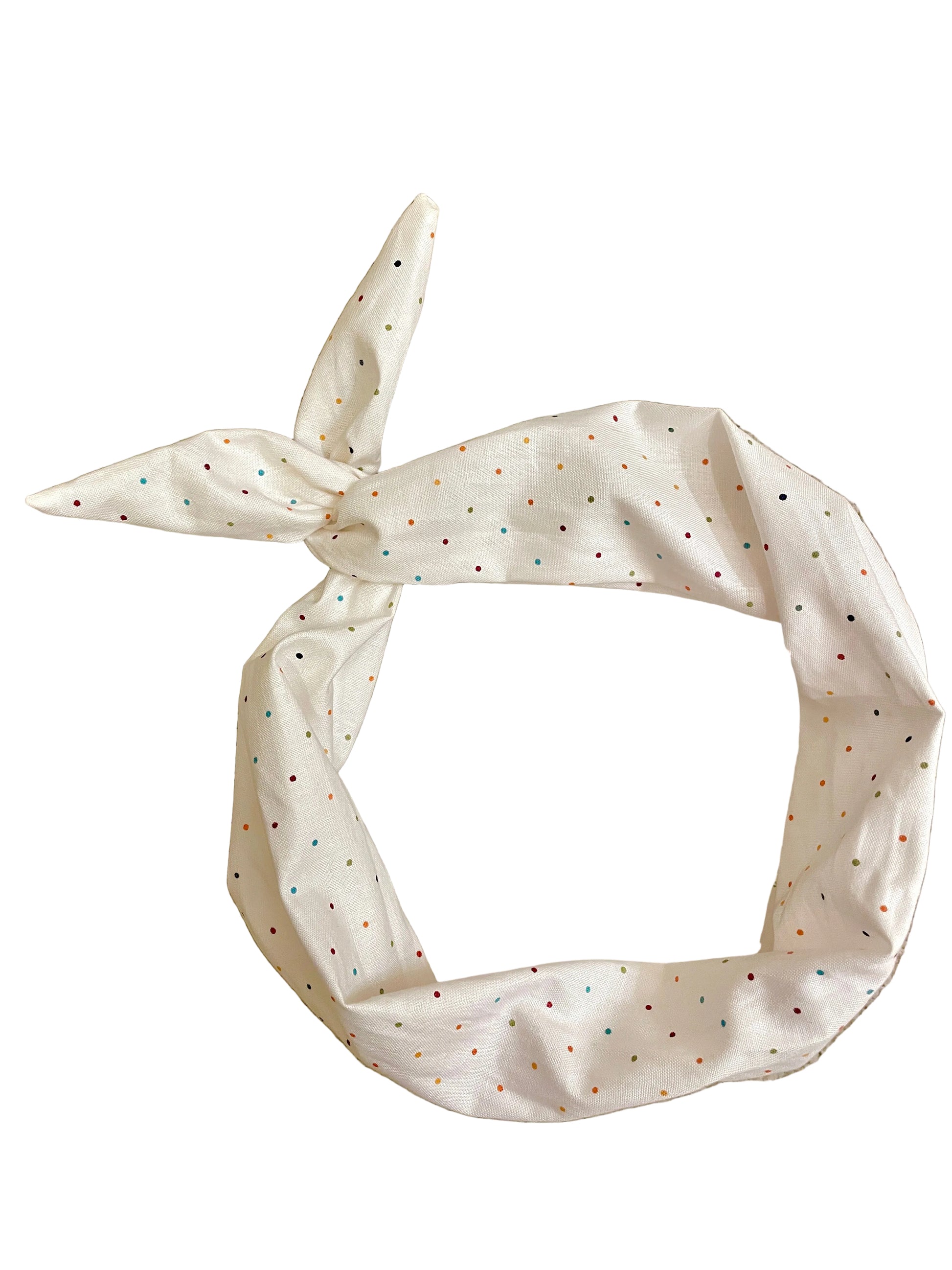 Amanda Bright Designs ivory fabric headband with small multicolored polka dots, tied in a knot