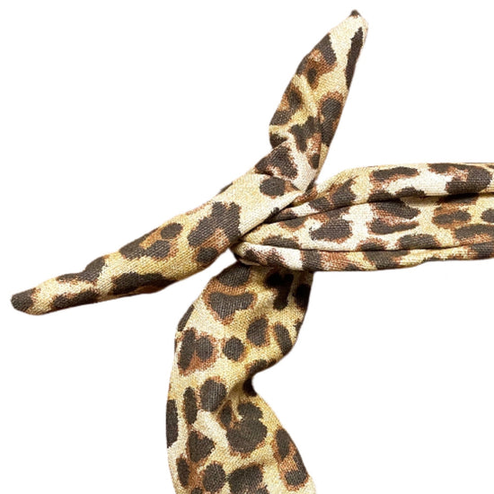 Amanda Bright Designs moldable bendable Leopard print headband on a white background